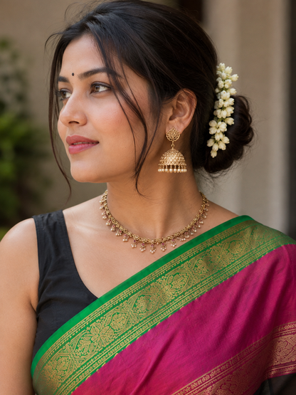 White Soft Silk Saree with Gold Woven Design & Tassels