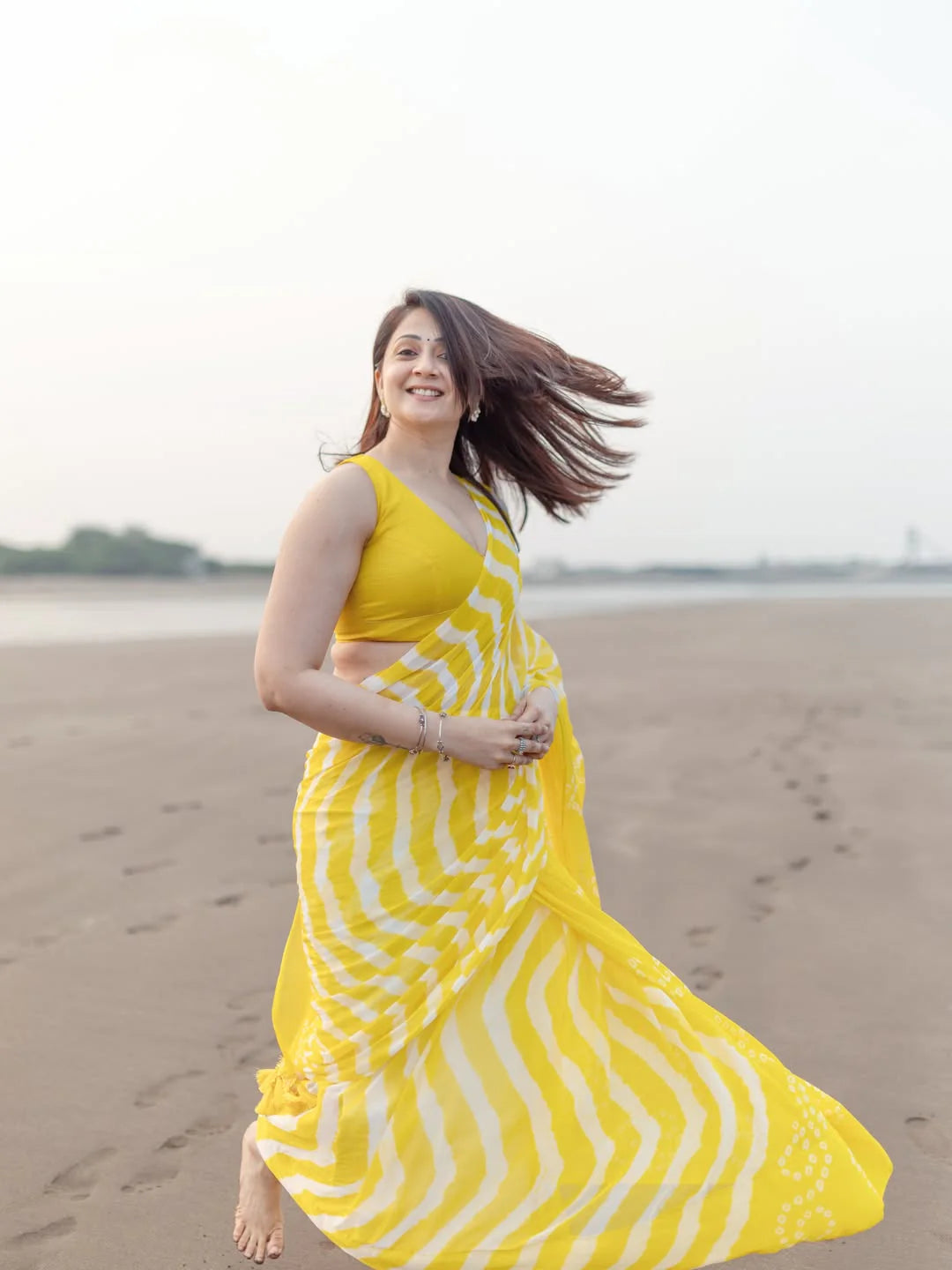 Sunshine Yellow & White Chiffon Printed Saree with Tassel Pallu
