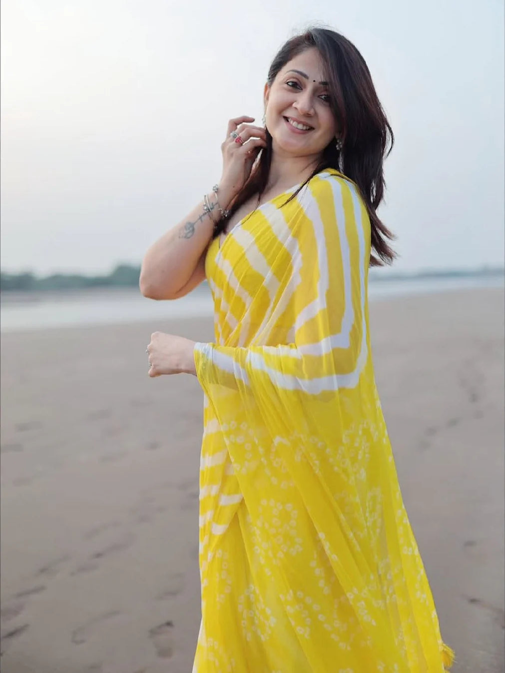 Sunshine Yellow & White Chiffon Printed Saree with Tassel Pallu